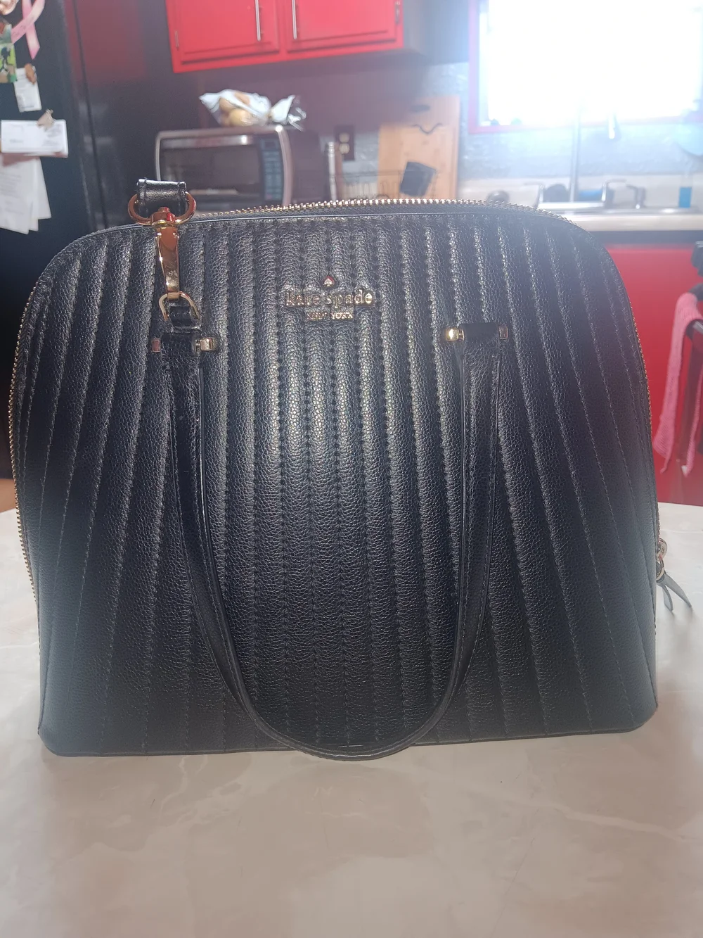 kate spade sleek kate